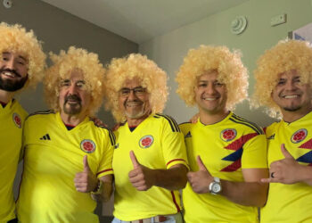 Steven Sánchez, along with his family all with the wig in honor to Pibe Valderrama, a renowned Colombian player. Photo: Steven Sánchez.