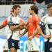 Aug 17, 2025; Vancouver, British Columbia, CAN; Vancouver Whitecaps FC midfielder Thomas Muller (13) shakes hands with Houston Dynamo FC defender Ethan Bartlow (4) post game at BC Place. Mandatory Credit: Anne-Marie Sorvin-Imagn Images