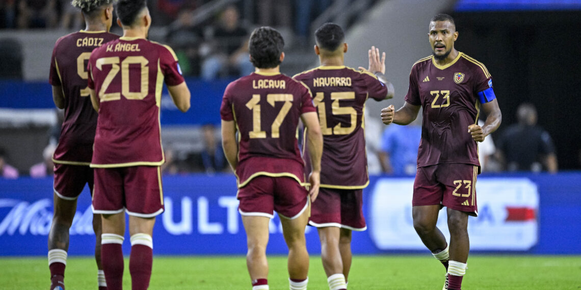 Jul 5, 2024; Arlington, TX, USA; Venezuela forward Jhonder Cadiz (9) and defender Wilker Angel (20) and forward Matias Lacava (17) and defender Miguel Angel Navarro (15) and forward Jose Salomon Rondon (23) during the game between Venezuela and Canada in the 2024 Copa America quarterfinal at AT&T Stadium. Mandatory Credit: Jerome Miron-USA TODAY Sports